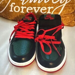 Nike Kids Black and Green Sneakers with Red Accents